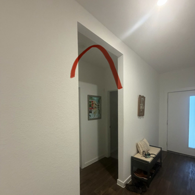 Title: Before - Description: Rectangular interior opening before a House Doctors of Austin remodeling project in Pflugerville, Texas.