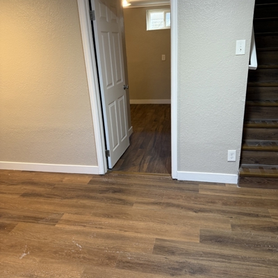 LVP Flooring Install in Basement Photo