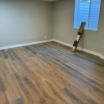 LVP Flooring Install in Basement Photo