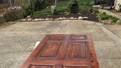 Expertly applied stain brings out rich tones and enhances curb appeal. Photo