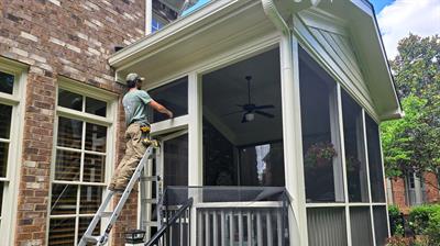 Installing screens in a porch in Kennesaw, GA Photo