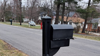 Mailbox Repair Due to Snow Plow Damage Photo